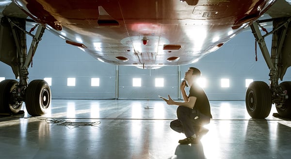 Engineer Under Aircraft