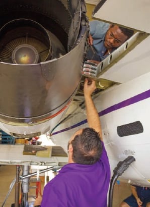 Alain Vallejo Maintenance Manager REVA Performing Aircraft Maintenance in Hangar